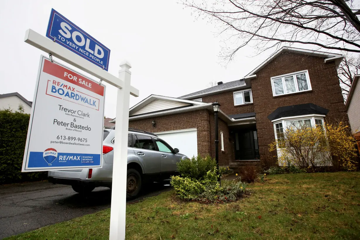 FILE PHOTO: Houses are seen for sale and under construction in a neighbourhood of Ottawa