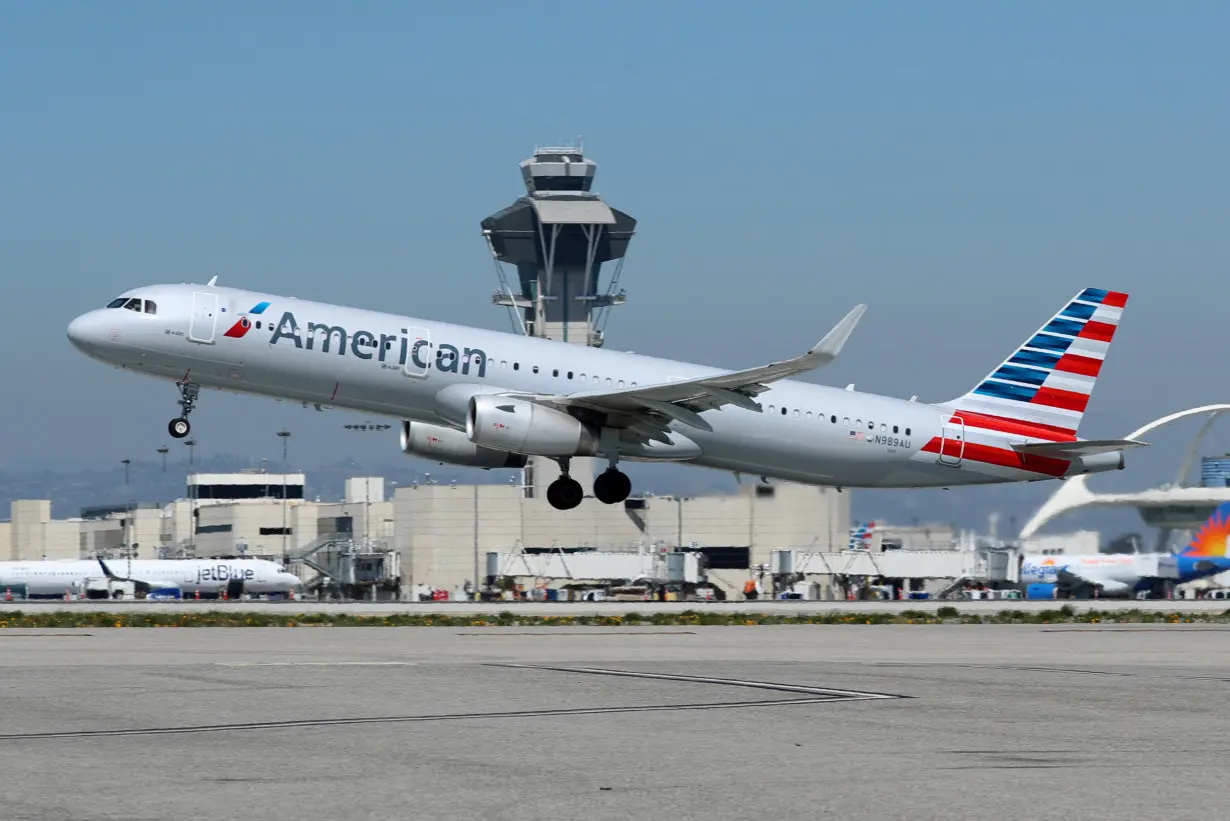 An American Airlines Airbus A321 plane takes off from Los Angeles International airport