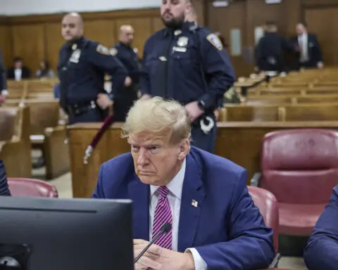 Trump forced to listen silently to people insulting him as he trades a cocoon of adulation for court