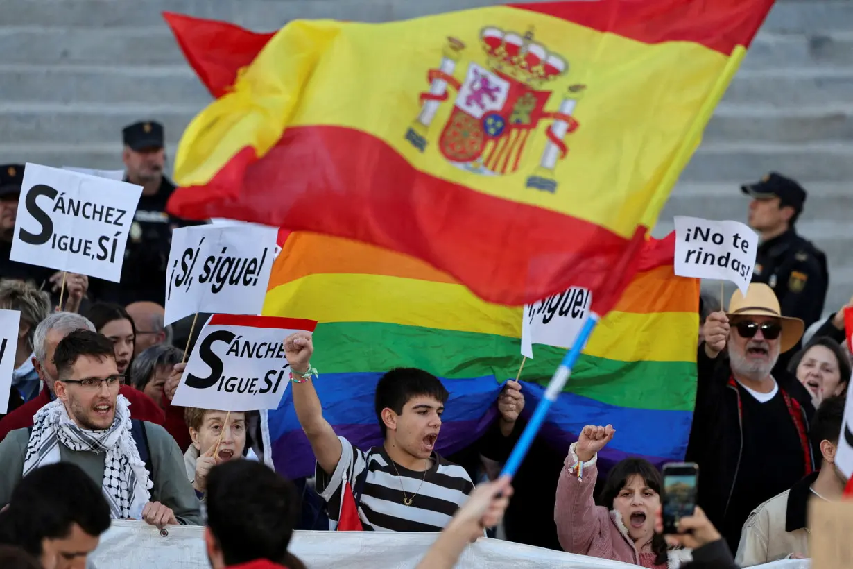 People march to show support for Spain's PM Sanchez, in Madrid