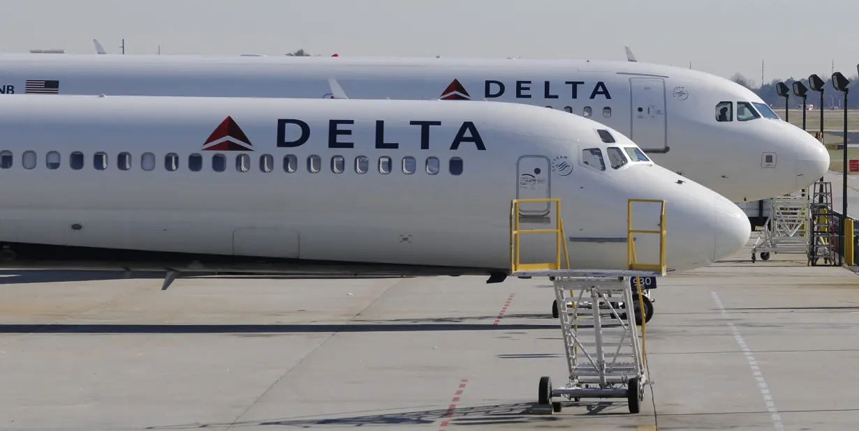 Delta Airlines MD-88 (foreground) with Airbus A320 (background) at Hartsfield-Jackson International Airport in Atlanta.