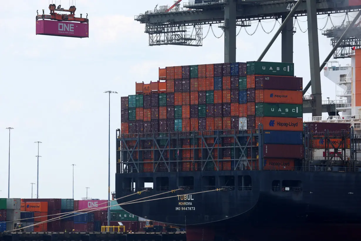 FILE PHOTO: Cargo ship loaded with shipping containers in Port Elizabeth, New Jersey