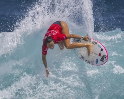 Surfers from Brazil and Australia win final Olympic qualifier in warm and windy Puerto Rico