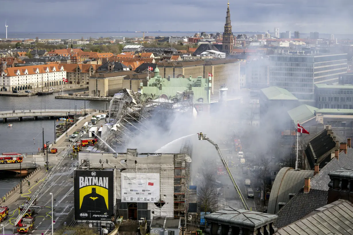 Copenhagen fights the last pockets of a fire that destroyed a 400-year-old landmark