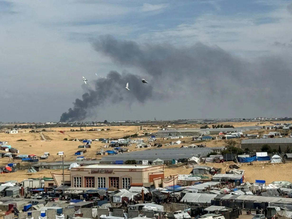 Smoke rises during an Israeli ground operation in Khan Younis, as seen from Rafah