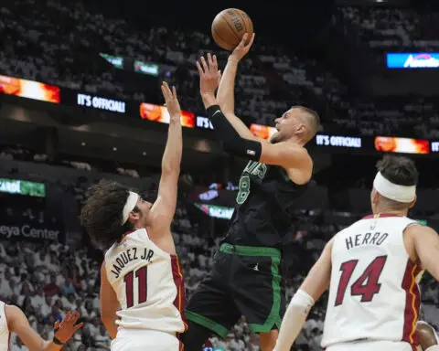 Celtics' Porzingis leaves playoff game in Miami with right calf tightness