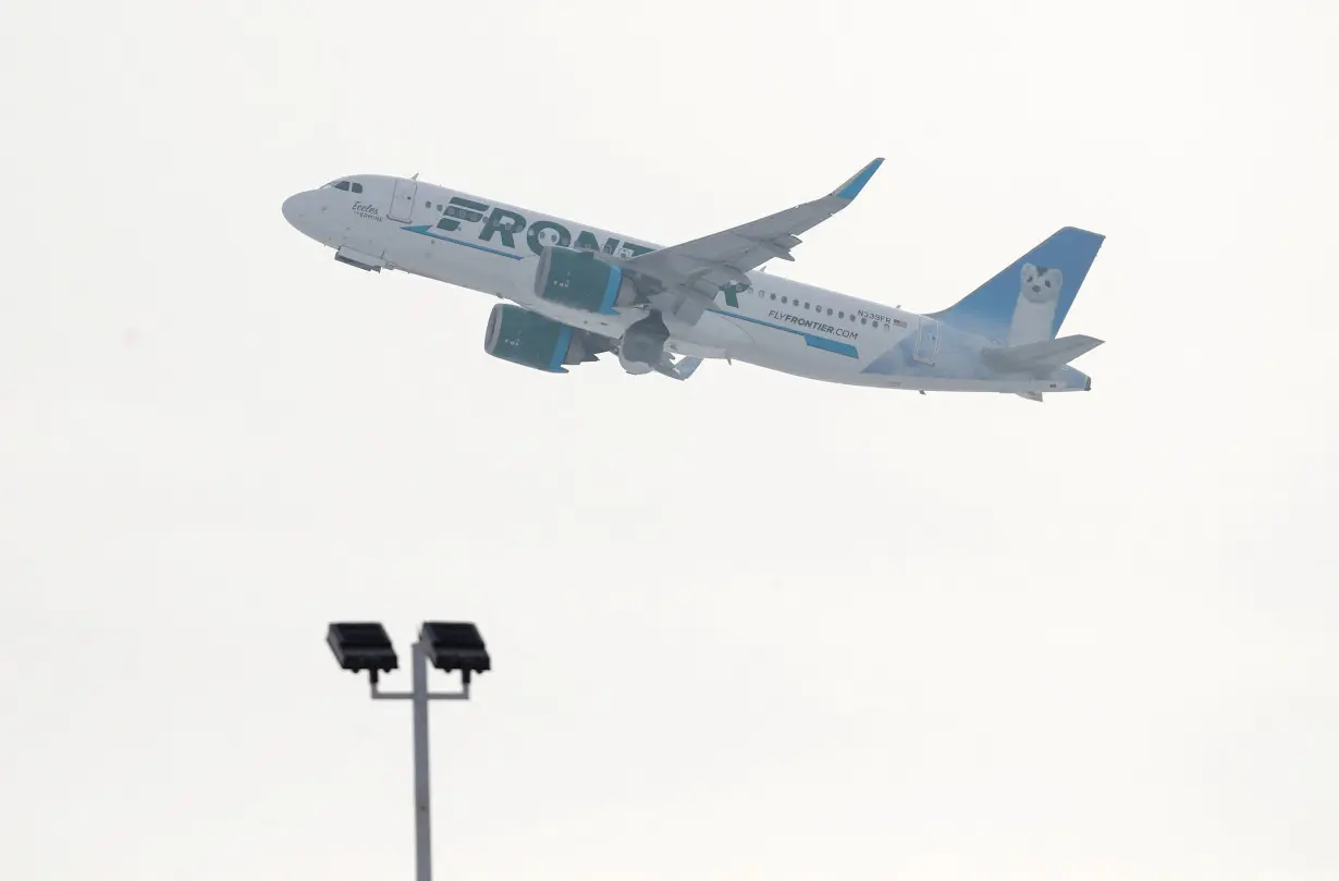 FILE PHOTO: A Frontier Airlines Airbus A320neo plane departs from O'Hare International Airport in Chicago