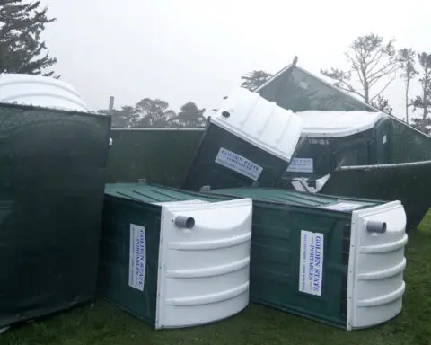 Pebble Beach is delayed because of saturated course and high wind. Clark leads by 1