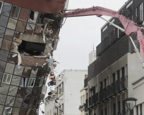 Rescue teams searching for family feared trapped in rockslide following Taiwan earthquake