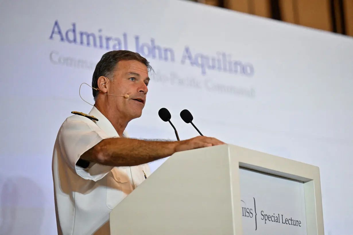 FILE PHOTO: Admiral John C. Aquilino, Commander of the United States Indo-Pacific Command speaks at the IISS Special Lecture in Singapore