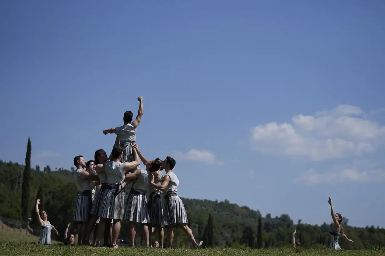 At birthplace of Olympics, performers at flame-lighting ceremony feel a pull of the ancient past