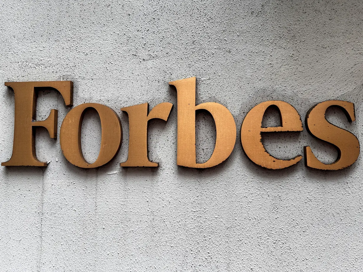 Forbes' unionized journalists stage first walk-out in magazine's history, in New York