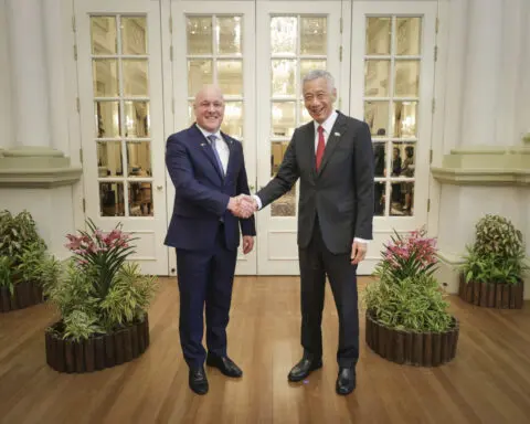 Singapore prime minister says he will step down on May 15 and hand post to his deputy