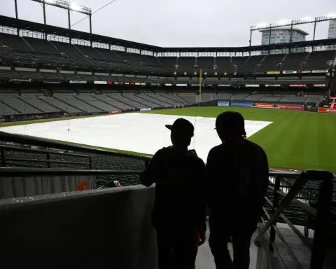 Patient fans wait out 5-hour rain delay for Royals vs. Orioles