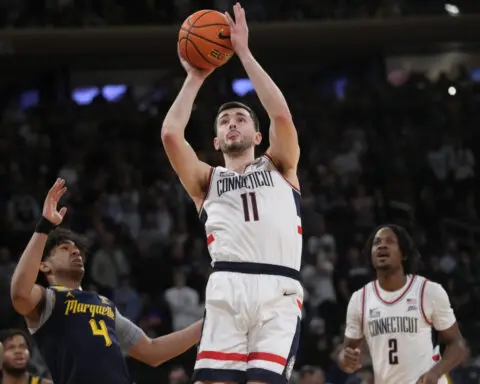 No. 2 UConn beats No. 10 Marquette 73-57 to win 1st Big East Tournament title since 2011