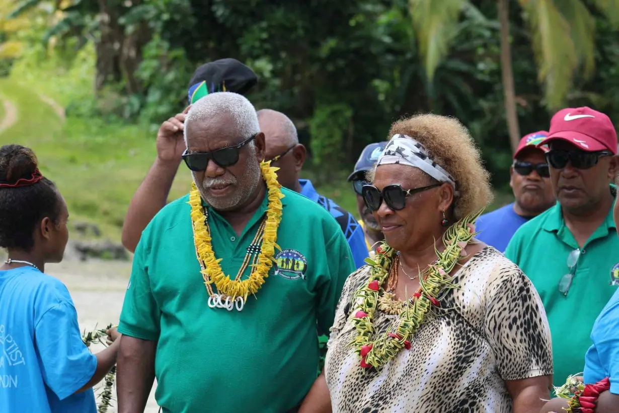 Democratic Alliance Party leader Rick Houenipwela campaigns in Small Malaita