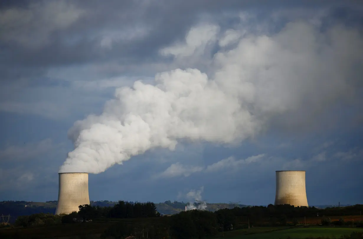 FILE PHOTO: Steam rises from a cooling tower of the Electricite de France (EDF) nuclear power plant in Golfech