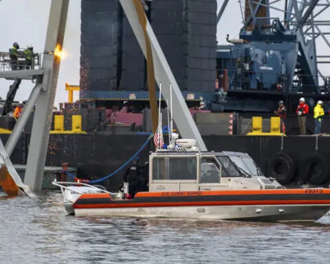 At collapsed Baltimore bridge, focus shifts to the weighty job of removing the massive structure