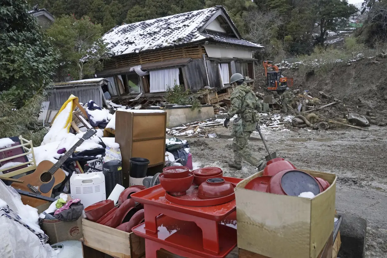 Thousands forced from homes by a deadly Japan earthquake on New Year's face stress and exhaustion