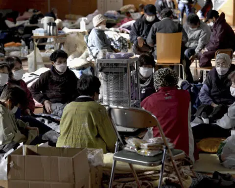 Thousands forced from homes by a deadly Japan earthquake on New Year's face stress and exhaustion