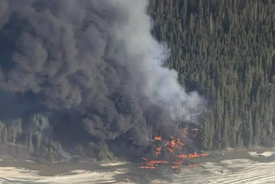 Douglas DC-4 plane crashes into river outside Fairbanks, Alaska; not clear how many people on board