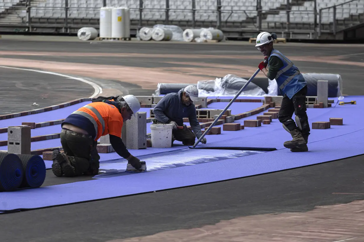 Seeing purple: Fans get a new track color and maybe record-breaking times at Paris Olympics