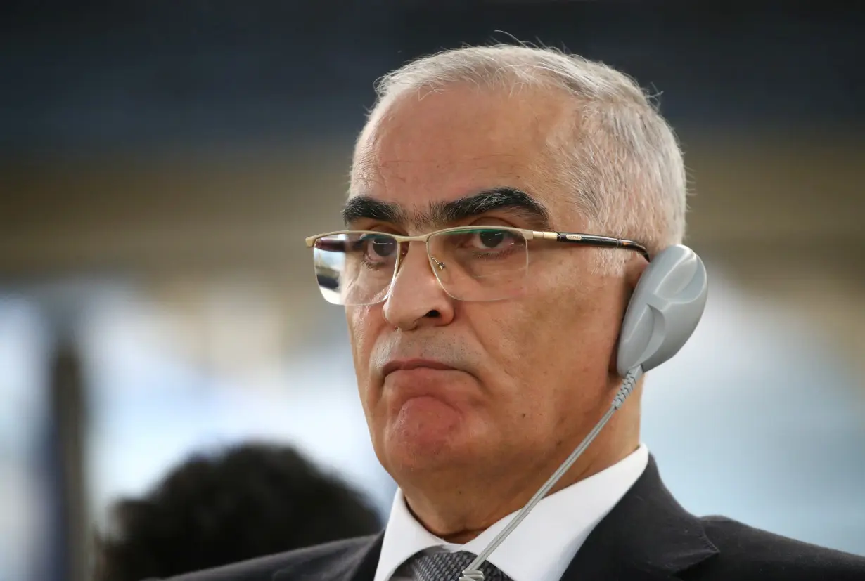 Khraishi Ambassador of Palestine to the UN attends a session of the Human Rights Council at the United Nations in Geneva