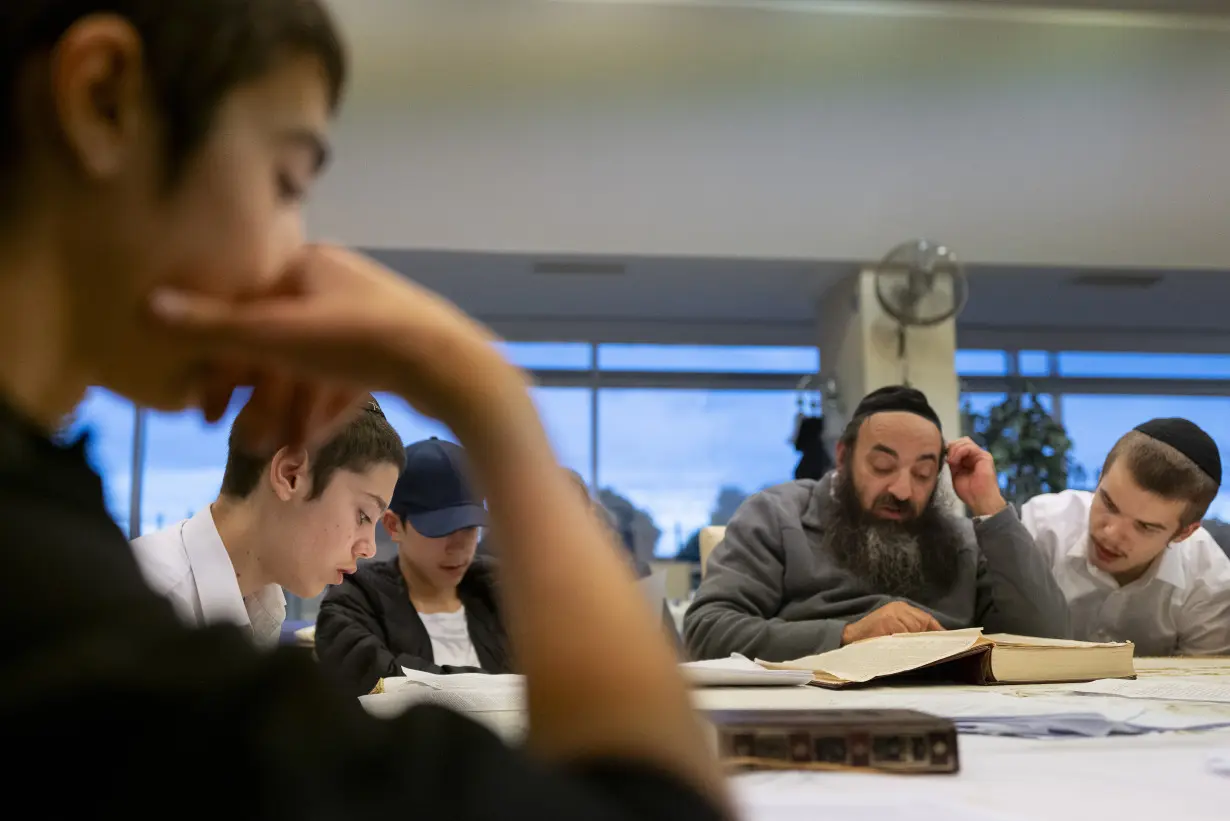 Jewish refugees from Israel find comfort and companionship in a countryside camp in Hungary