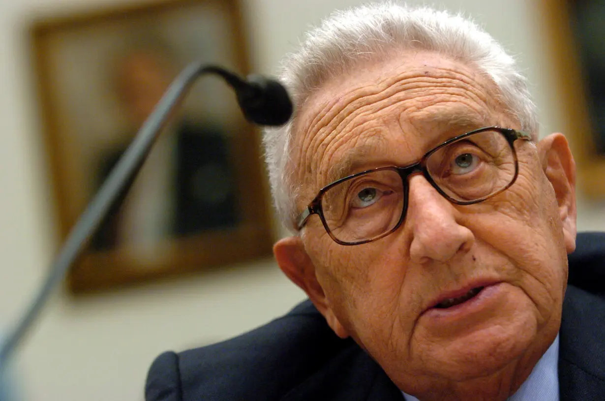 FILE PHOTO: Kissinger addresses House Committee on International Relations about the Middle East peace process.