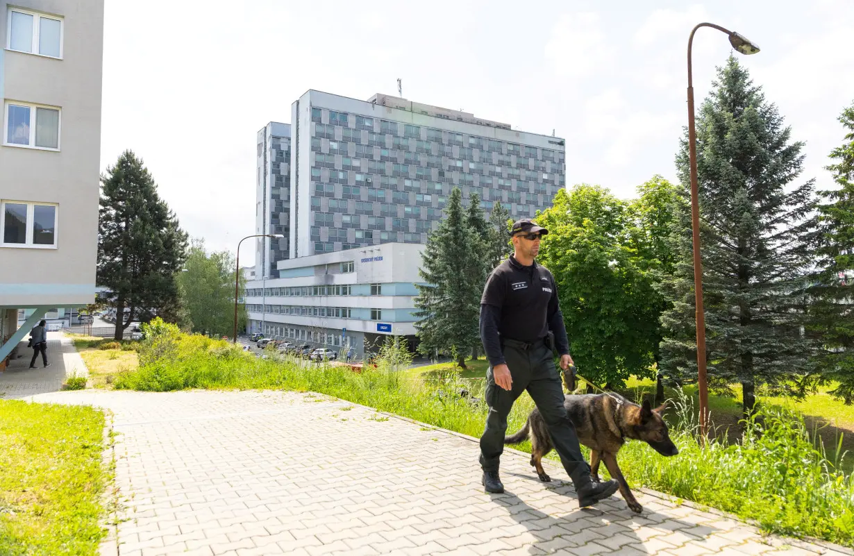 FILE PHOTO: Police officer with a dog inspect area around the F.D. Roosevelt University Hospital