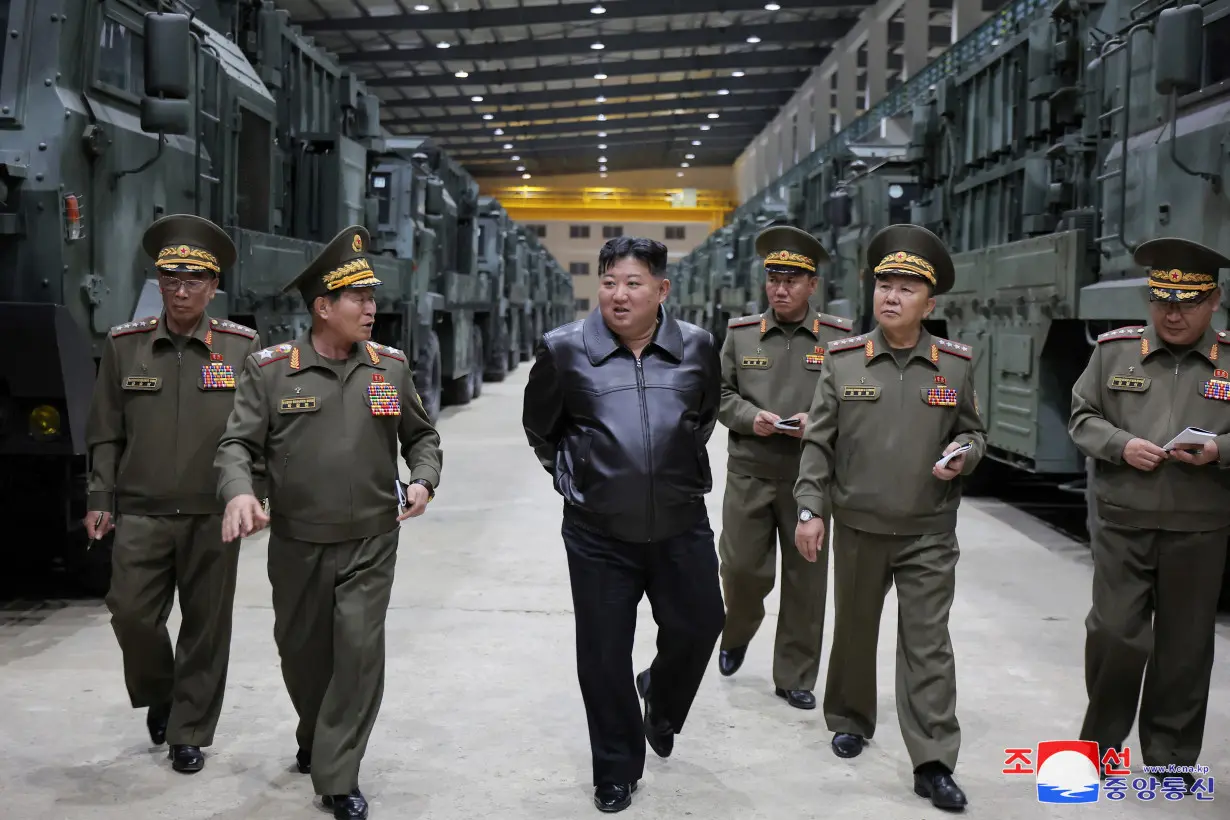 North Korean leader Kim Jong Un oversees a tactical missile weapons system