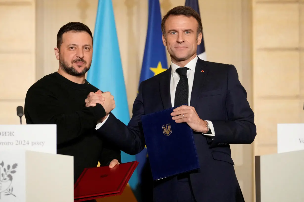 FILE PHOTO: French President Macron meets Ukraine's President Zelenskiy in Paris