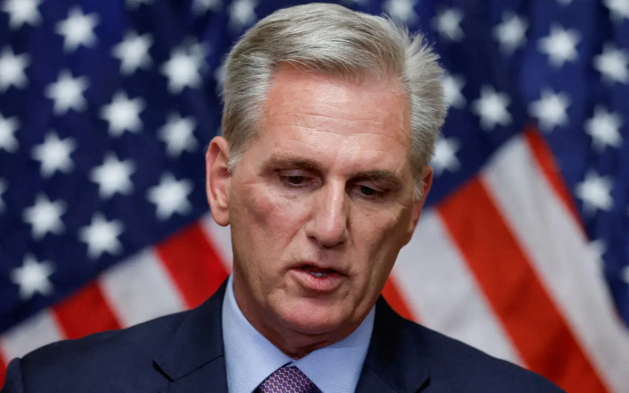 FILE PHOTO: Former House Speaker Kevin McCarthy speaks to reporters after he was ousted from the position in Washington