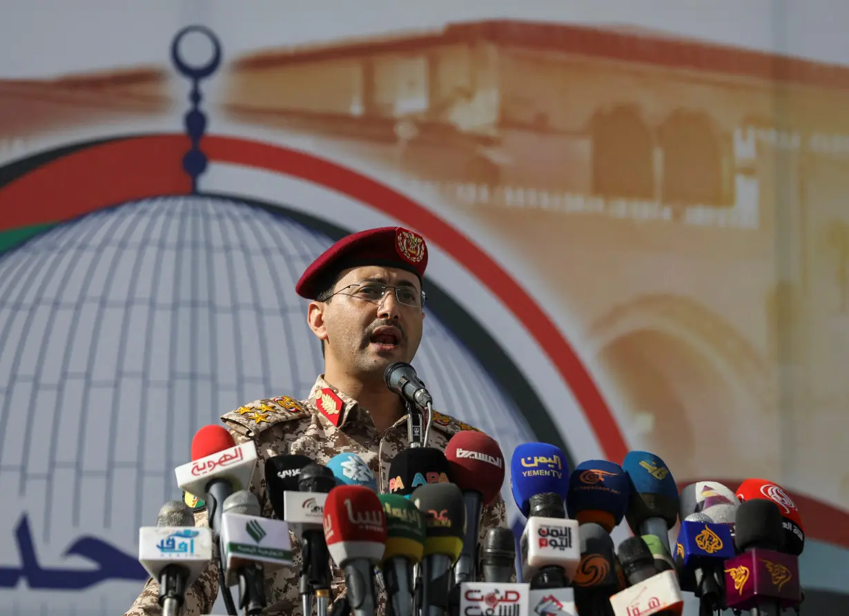 Houthi military spokesman, Yahya Sarea, delivers a statement during a pro-Palestinian rally in Sanaa