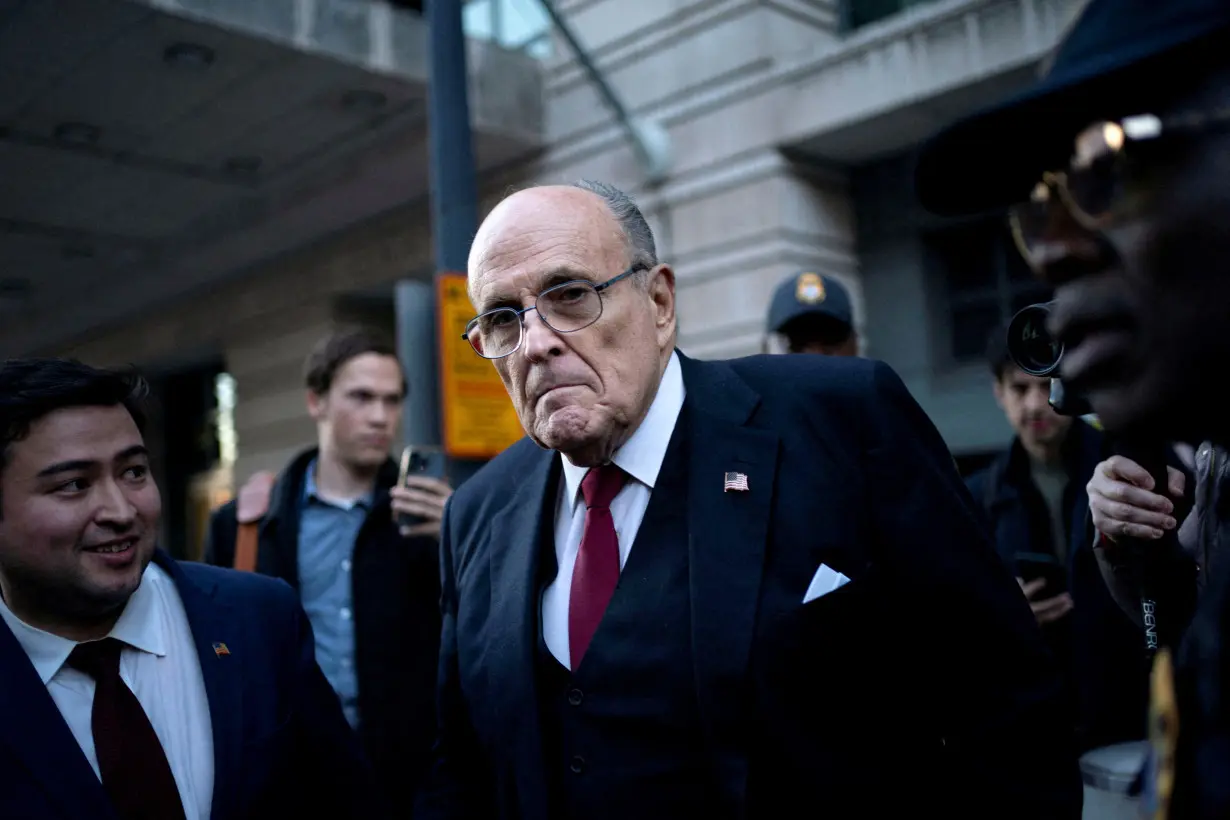 FILE PHOTO: Former New York Mayor Rudy Giuliani departs defamation lawsuit at the District Courthouse in Washington