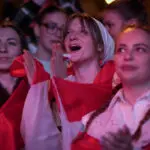 Swiss fans get ready to welcome Eurovision winner Nemo back home