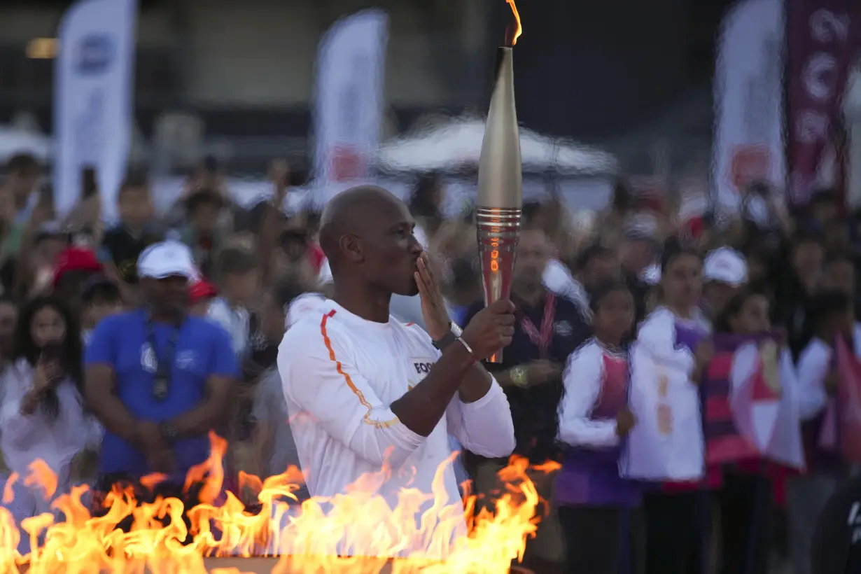 LA Post: Torchbearers in Marseille kick off the Olympic flame's journey across France