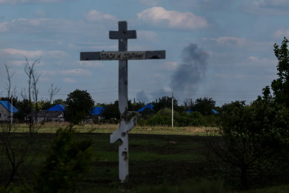 Smoke rises after a Russian military strike in the town of Lyman