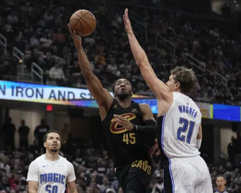 Donovan Mitchell scores 39 points as Cavaliers push past Magic 106-94 in Game 7 to get Boston next