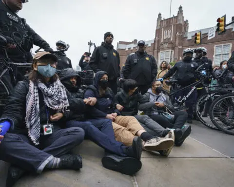 Police arrest dozens as they break up pro-Palestinian protests at several US universities