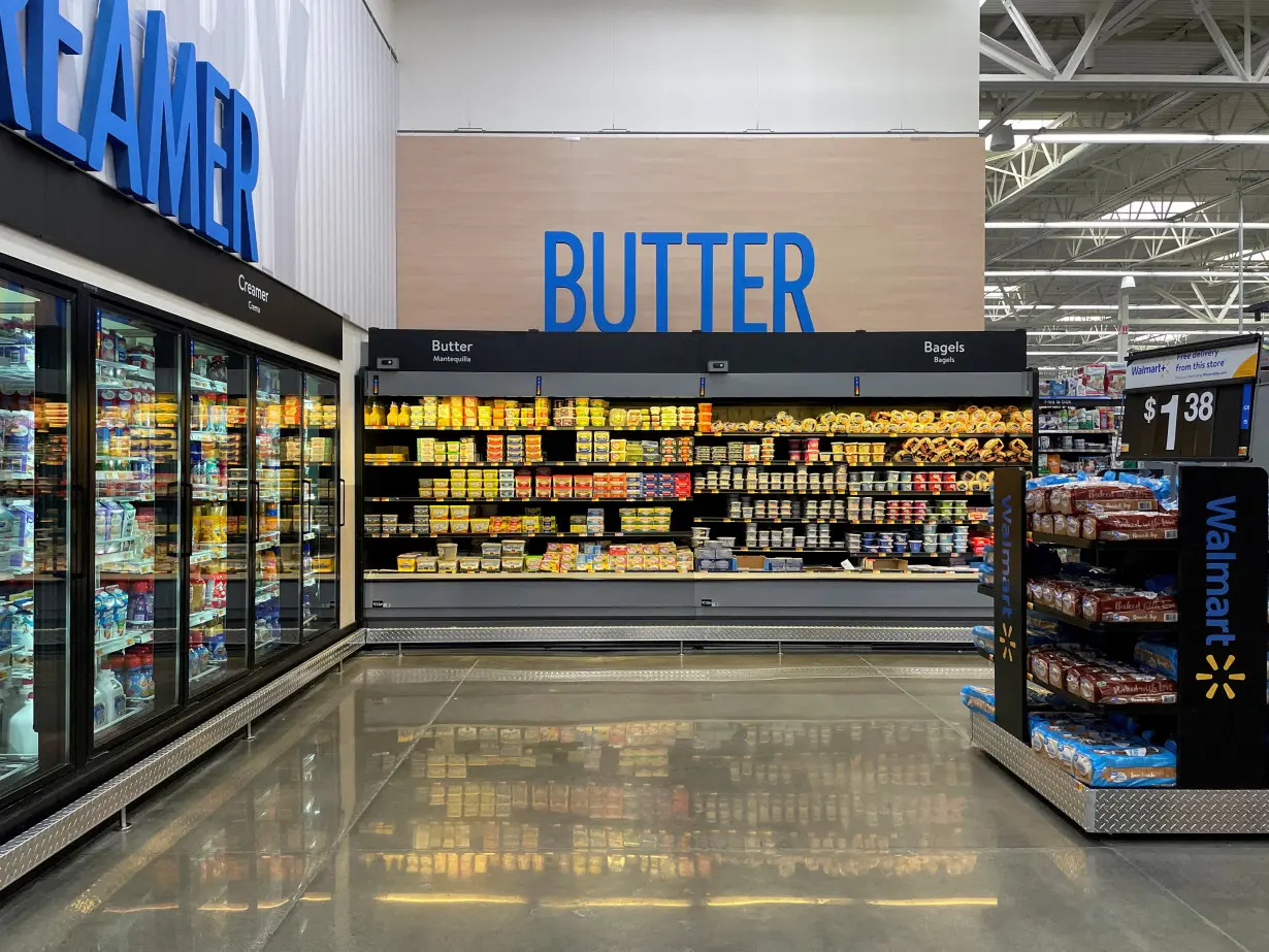 FILE PHOTO: FILE PHOTO: View of an aisle with new signage at Walmart's newly remodeled Supercenter, in Teterboro