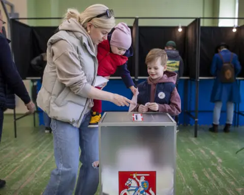 Lithuanians vote in a presidential election as anxieties rise over Russia and the war in Ukraine