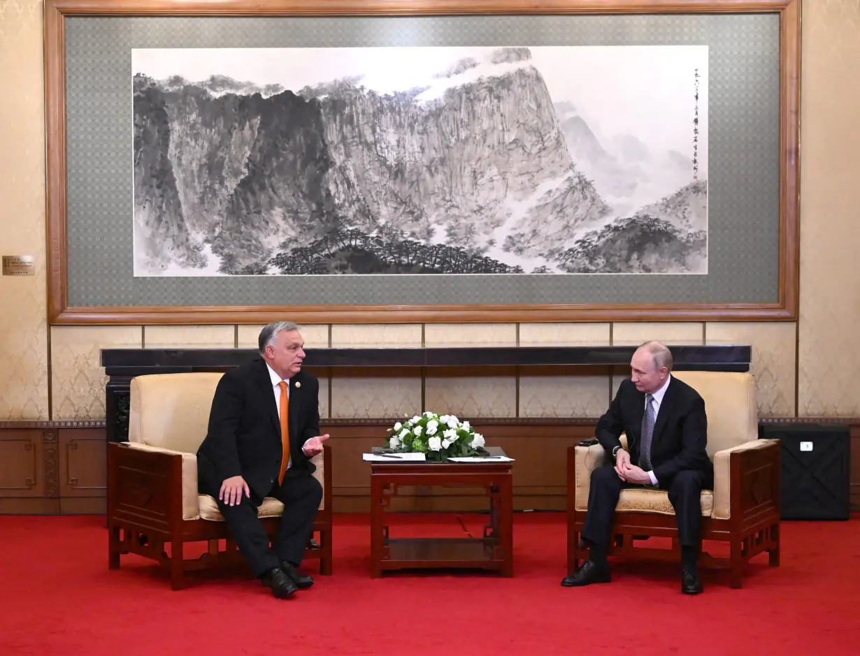 Russian President Putin and Hungarian Prime Minister Orban meet in Beijing