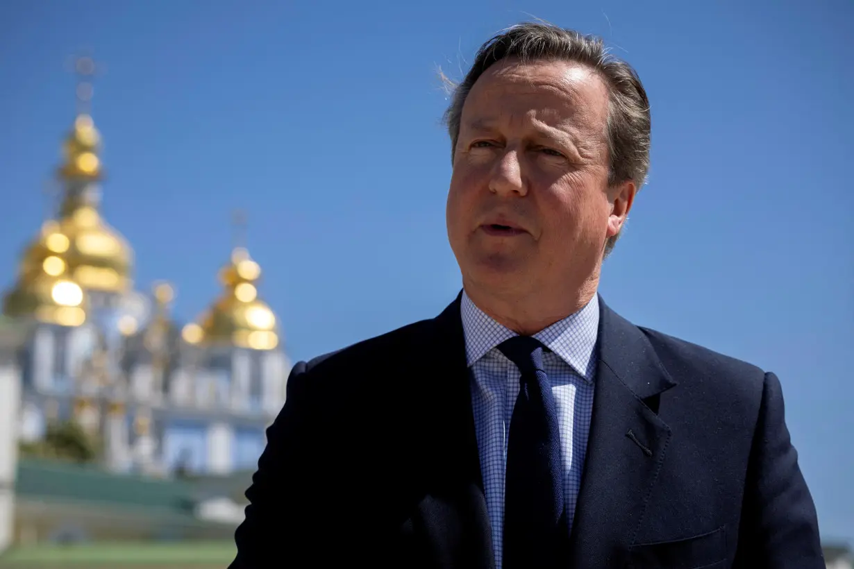 In 'dangerous world', UK's Cameron says NATO must be tougher, spend more