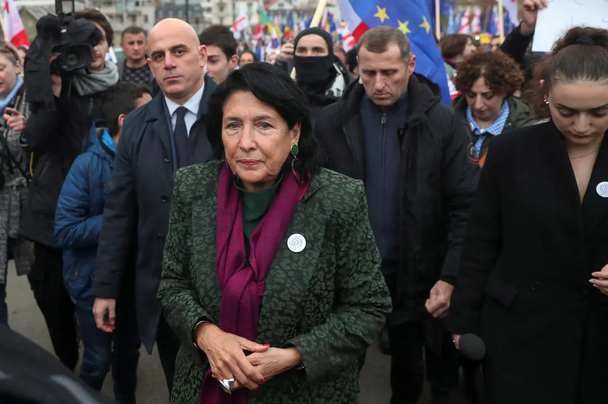 FILE PHOTO: Participants, including Georgia's President Salome Zourabichvili, walk during a procession in support of the country's membership in the European Union in Tbilisi ,