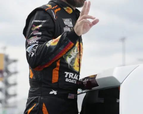 Truex wins pole at Martinsville as he again faces championship elimination in NASCAR playoffs