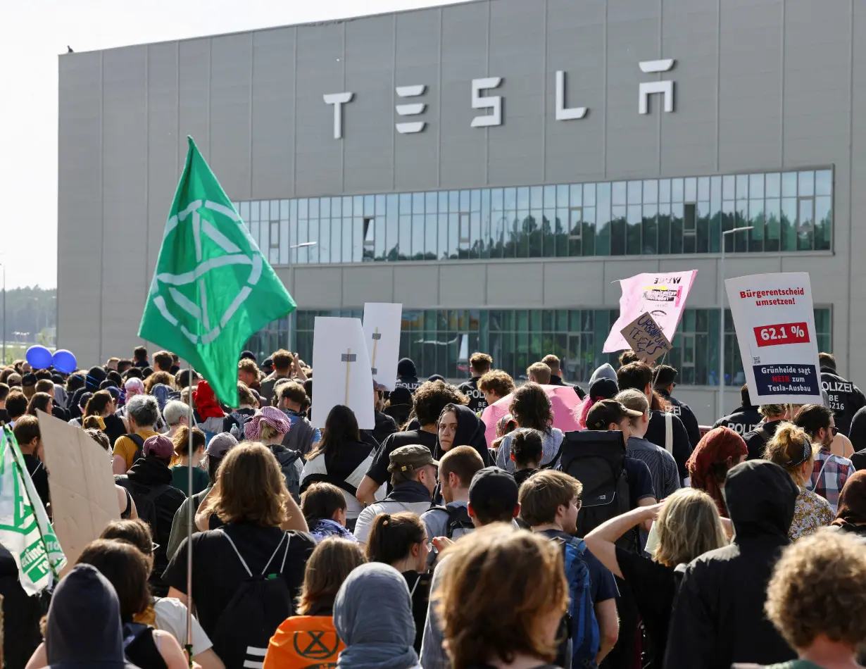 FILE PHOTO: Activists protest against the expansion of the Tesla Gigafactory in Gruenheide, Germany