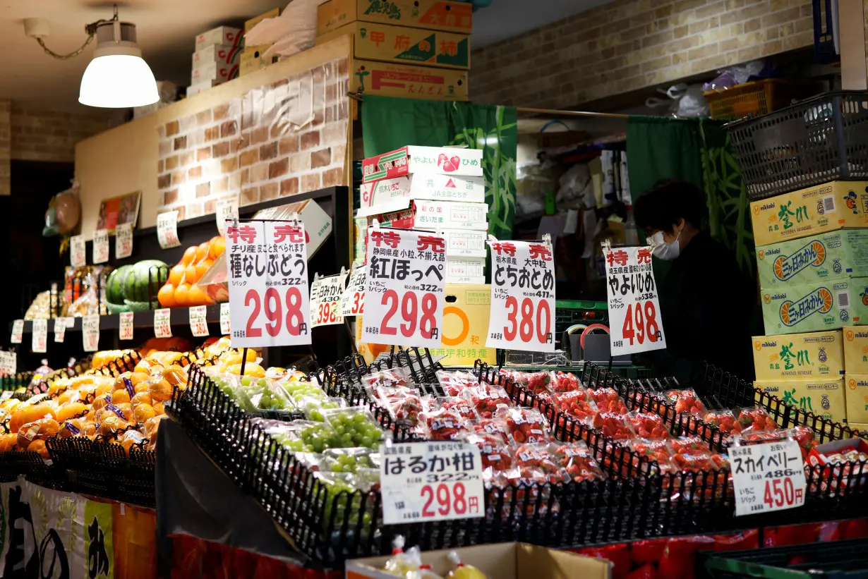 A view of a vegetable stand with prices at a supermarket in Tokyo