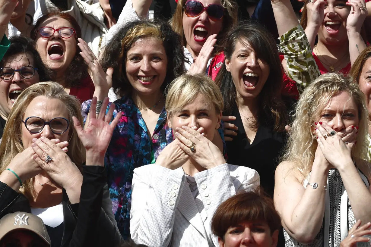 The 77th Cannes Film Festival - Group photo against violence towards women