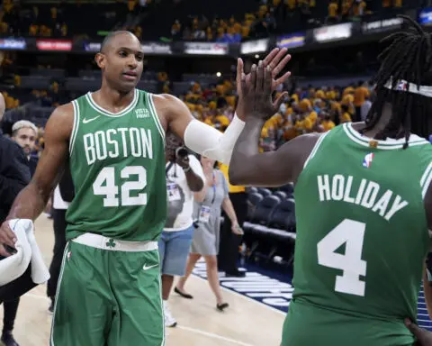 Jrue Holiday's finishing flurry helps Celtics beat Pacers 114-111 for 3-0 lead in East finals